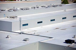 Roofs of the big warehouse - aerial view